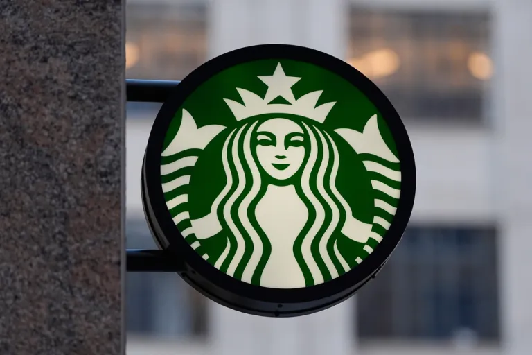 The Starbucks logo is displayed on a coffee shop.