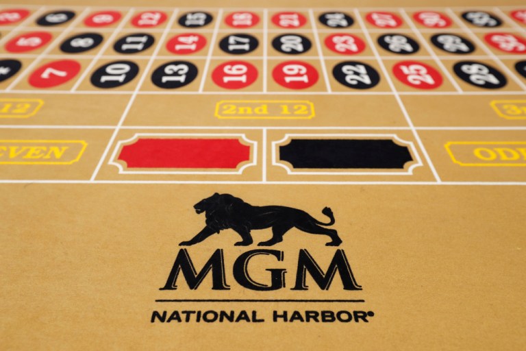 FILE - The MGM National Harbor logo is seen on a roulette table in the casino during a preview tour of the MGM National Harbor, Dec. 2, 2016 in Oxon Hill, Md. (AP Photo/Alex Brandon, File)