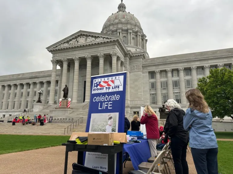 Abortion opponents prepare for a rally at the Missouri Capitol.