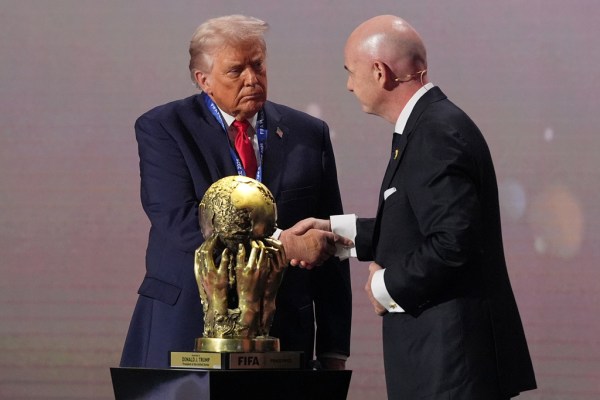 Trump finally gets his peace prize as FIFA hands him inaugural award at World Cup draw