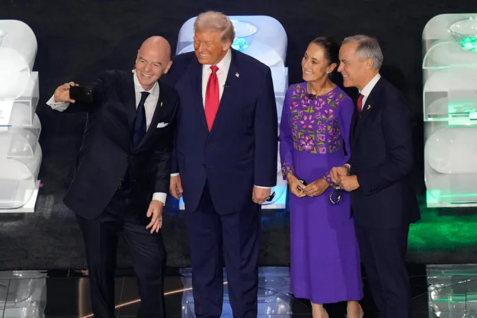 FIFA President Gianni Infantino takes a selfie with President Donald Trump, Mexican President Claudia Sheinbaum, and Canadian Prime Minister Mark Carney.