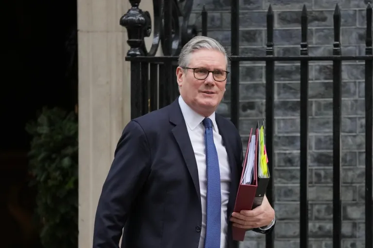 U.K. Prime Minister Keir Starmer leaves 10 Downing Street to attend the weekly Prime Ministers' Questions session in Parliament in London.