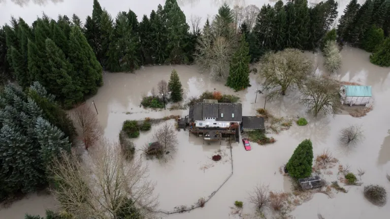 A home is surrounded by flood waters.