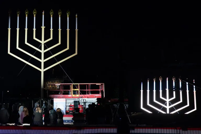 People look at the menorah during the annual National Menorah Lighting in celebration of Hanukkah.