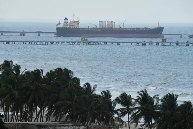 Evana, an oil tanker, is docked at El Palito port in Puerto Cabello, Venezuela, Sunday, Dec. 21, 2025. (AP Photo/Matias Delacroix)