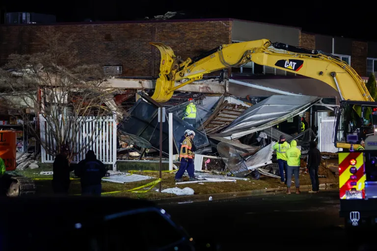 First responders work at the scene of an explosion and fire at Bristol Health & Rehab Center, Tuesday, Dec. 23, 2025, in Bristol, Pa. (Monica Herndon/The Philadelphia Inquirer via AP)