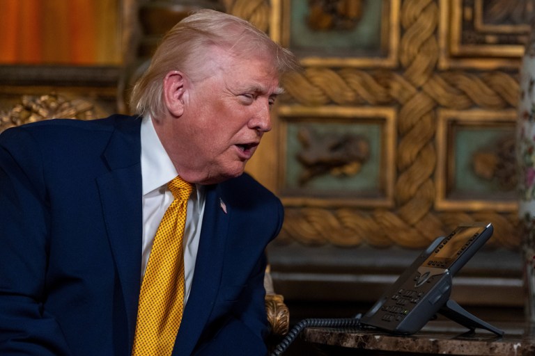 President Donald Trump speaks during a NORAD Santa Claus call at his Mar-a-Lago club.