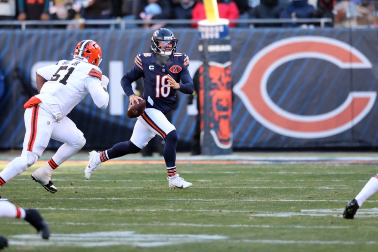 Chicago Bears quarterback Caleb Williams (18) looks to throw a pass against the Cleveland Browns during an NFL football game in Chicago, Sunday, Dec. 14, 2025.