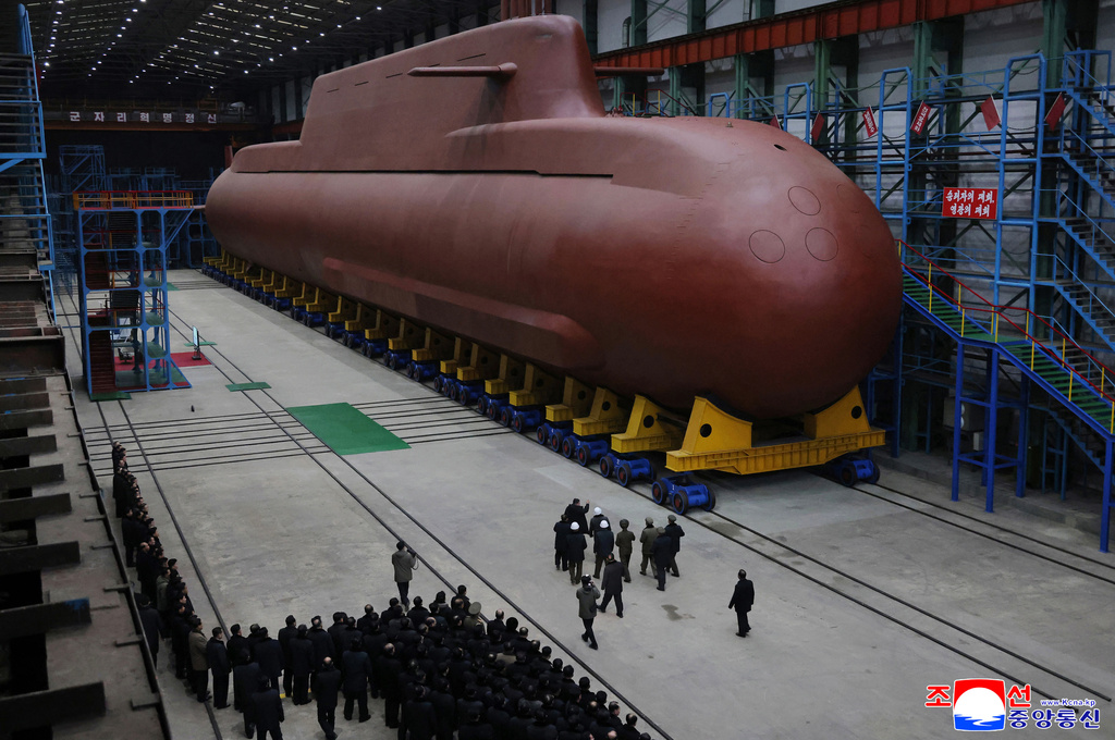 Kim Jong Un swipes at South Korea’s progress building a nuclear submarine while inspecting his own