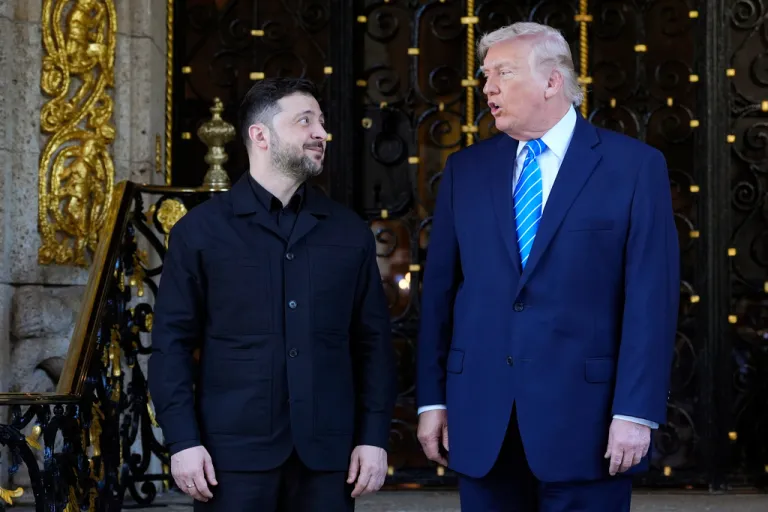 President Donald Trump greets Ukrainian President Volodymyr Zelensky at his Mar-a-Lago club.