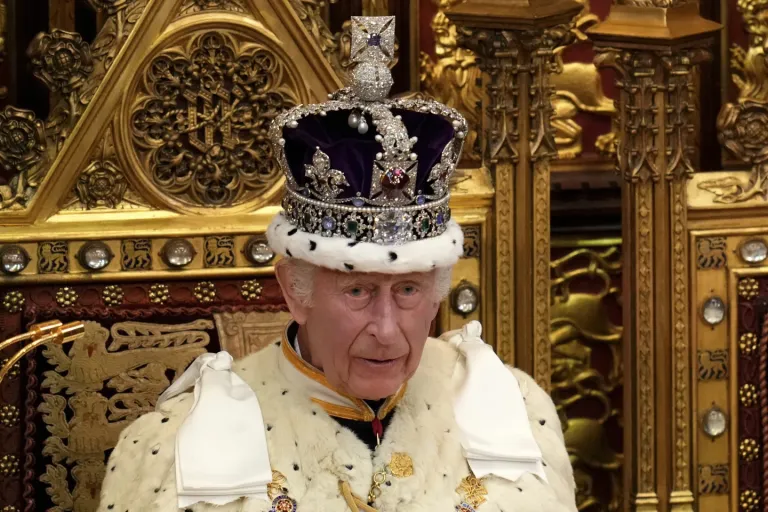 King Charles III wearing the Imperial State Crown attends the State Opening of Parliament in the House of Lords, London, Wednesday, July 17, 2024.