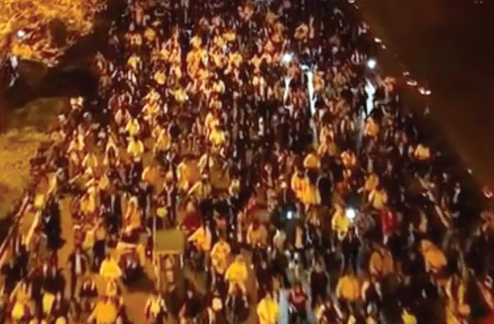 A fraction of the thousands of young people riding bicycles overnight in central China in June 2024.