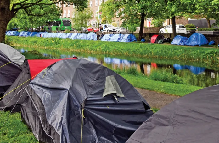 The tents of asylum-seekers line both sides of Dublin’s Grand Canal, May 8, 2024. (Artur Widak/NurPhoto/Getty)
