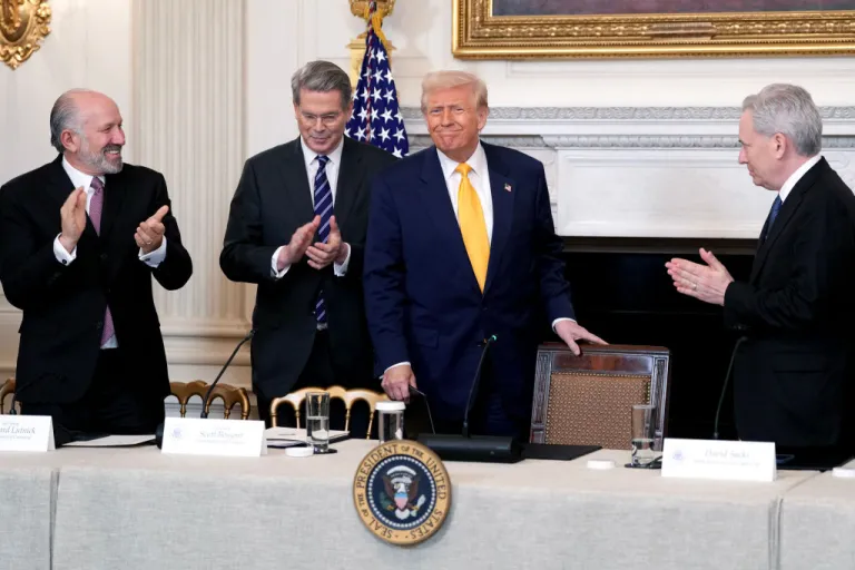 Howard Lutnick, US commerce secretary, from left, Scott Bessent, US treasury secretary, US President Donald Trump, and David Sacks, White House Artificial Intelligence (AI) and Crypto czar, during The White House Digital Assets Summit in the State Dining Room of the White House in Washington, DC, US, on Friday, March 7, 2025. A simmering tension in the crypto industry resurfaced after President Donald Trump signed a long-awaited order creating a strategic Bitcoin reserve and an additional stockpile of other digital assets. Photographer: Chris Kleponis/CNP/Bloomberg via Getty Images