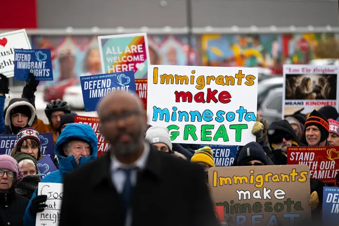 Demonstrators rally outside a Target location on December 4, 2025 in Minneapolis, Minnesota. Local activists have accused Target of allowing ICE officers to stage in their parking lots as the Trump administration has targeted the Somali immigrant community and increased operations in Minnesota this week. (Photo by Stephen Maturen/Getty Images)