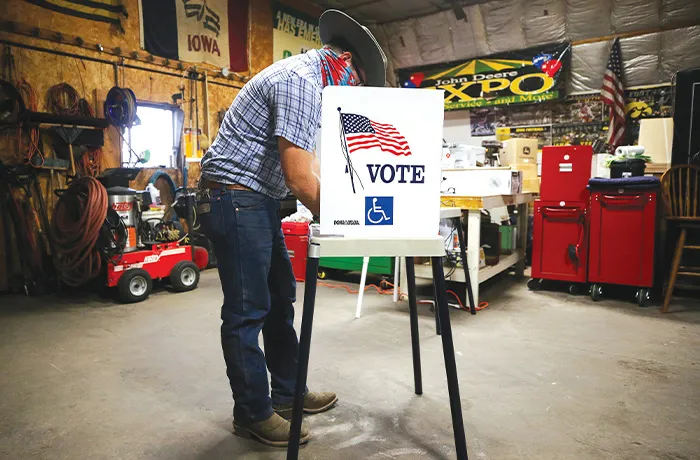 A voter marks his ballot at a polling place in Dennis Wilkening’s shed on November 3, 2020, in Richland, Iowa. (Mario Tama/Getty Images)