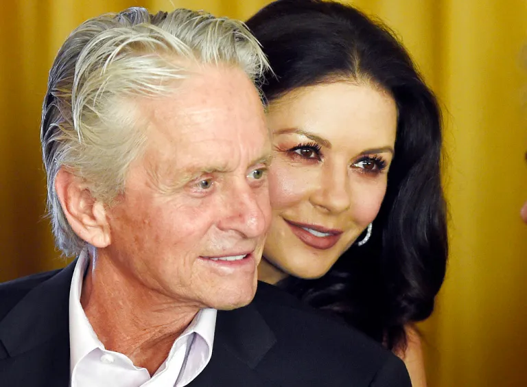 In this Dec. 9. 2016, file photo, actor Michael Douglas and his wife, actress Catherine Zeta-Jones, attend a party at the Beverly Hills Hotel in Beverly Hills, Calif. Catherine Zeta-Jones said that her husband, who has denied allegations of sexual harassment, is a strong supporter of the #MeToo movement. (Photo by Chris Pizzello/Invision/AP, File)