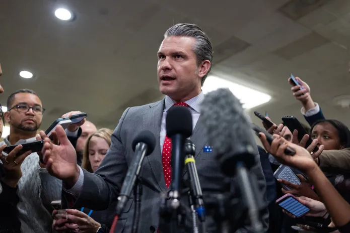 Department of War Secretary Pete Hegseth speaks to reporters.