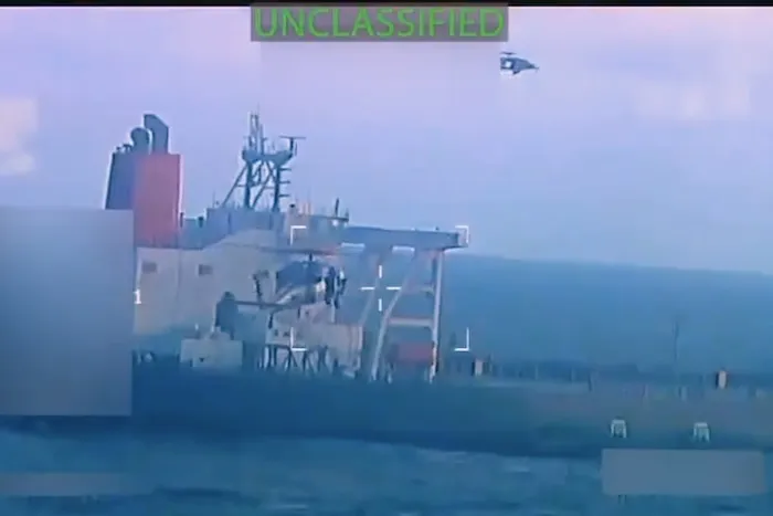 This image from video posted on Attorney General Pam Bondi's X account, and partially redacted by the source, shows an oil tanker being seized by U.S. forces off the coast of Venezuela, Wednesday, Dec. 10, 2025. (U.S. Attorney General's Office/X via AP) Screenshot