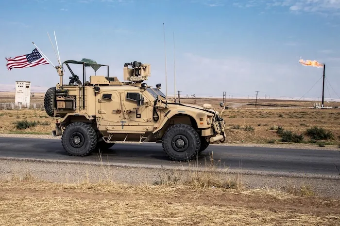 U.S. forces patrol oil fields in Syria.