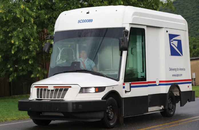 A U.S. Postal Service worker drives one of the Next Generation Delivery Vehicle. (Paul Weaver/SOPA Images/LightRocket via Getty Images)