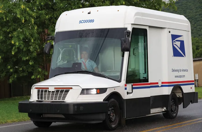 A U.S. Postal Service worker drives one of the Next Generation Delivery Vehicle. (Paul Weaver/SOPA Images/LightRocket via Getty Images)
