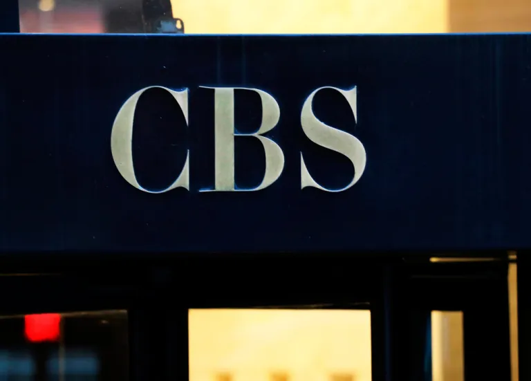 The CBS logo at the entrance to its headquarters, in New York Dec. 6, 2018. (AP Photo/Mark Lennihan, File)