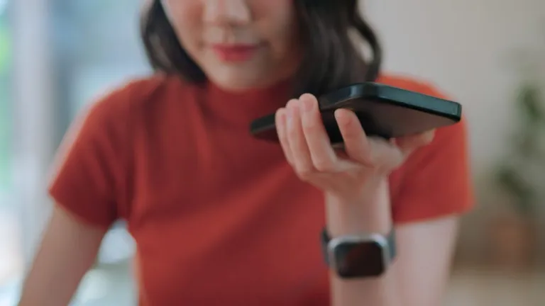 Woman using a phone.