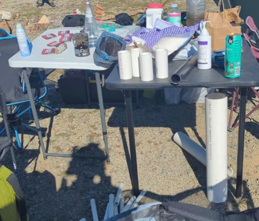 The criminal complaint includes photos of what investigators believe were bomb-making materials strewn across the group's campsite.