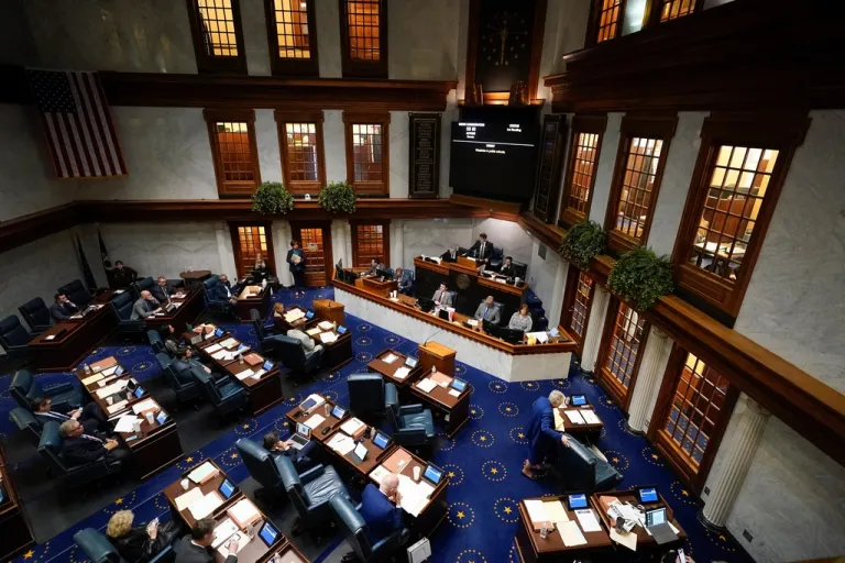 Senators meet in the Senate chamber at the Statehouse in Indianapolis.