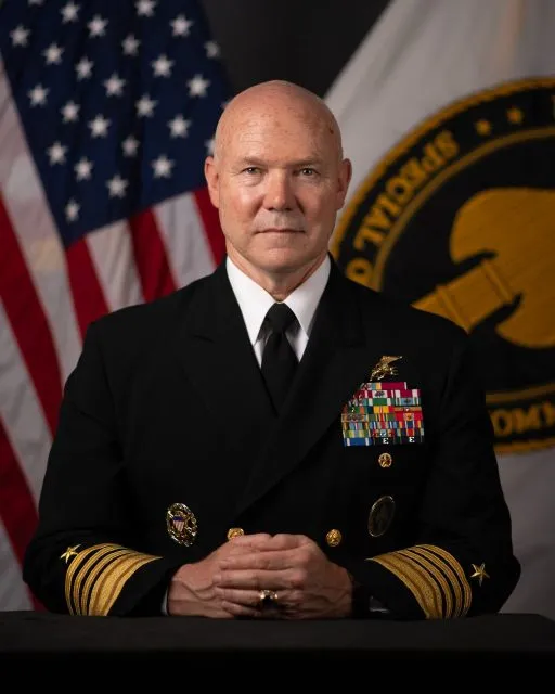 Official headshot of Navy Adm. Mitch Bradley.