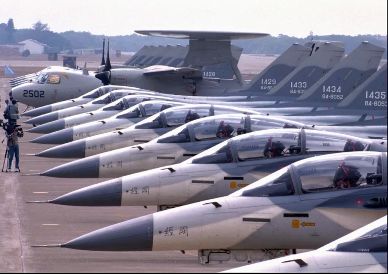 Some of the 18 Taiwanese-built Indigenous Defensive Fighters and one U.S.-made E-2T airborne warning plane are displayed at Chingchuankang military base.