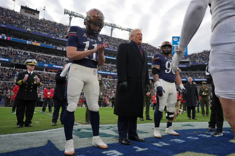 Trump at the coin toss for the Army-Navy game.