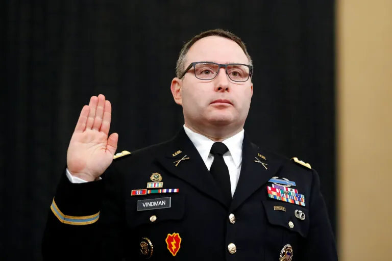National Security Council aide Lt. Col. Alexander Vindman is sworn in to testify before the House Intelligence Committee on Capitol Hill in Washington, Tuesday, Nov. 19, 2019, during a public impeachment hearing of President Donald Trump's efforts to tie U.S. aid for Ukraine to investigations of his political opponents.