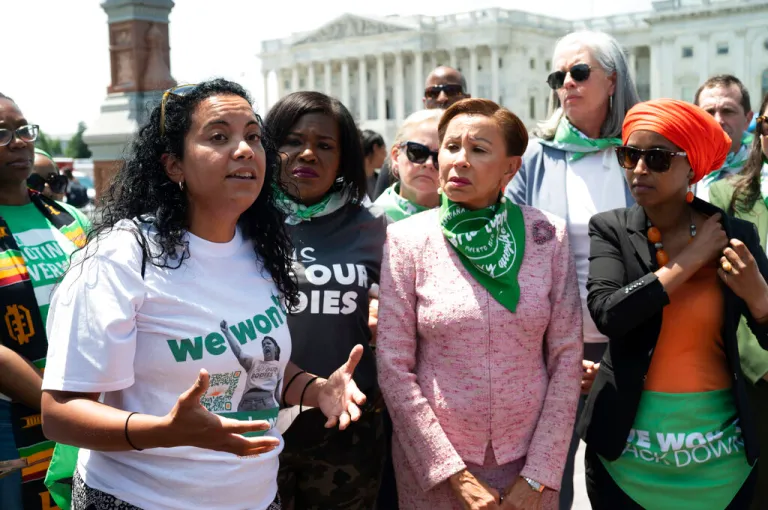 IMAGE DISTRIBUTED FOR CPD ACTION - Analilia Mejia, Co-Executive Director of the Center for Popular Democracy Action, left, speaks an abortion rights action with Rep. Cori Bush, D-Mo., Rep. Nydia Velazquez, D-N.Y., second from right, and Rep. Ilhan Omar, D-Minn., right, on Tuesday, July 19, 2022 in Washington. (Kevin Wolf/AP Images for CPD Action)