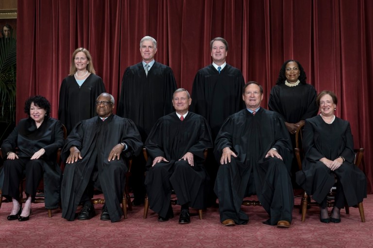 Members of the Supreme Court sit for a group portrait in Washington, Oct. 7, 2022. Bottom row, from left, Justice Sonia Sotomayor, Justice Clarence Thomas, Chief Justice John Roberts, Justice Samuel Alito and Justice Elena Kagan. Top row, from left, Justice Amy Coney Barrett, Justice Neil Gorsuch, Justice Brett Kavanaugh, and Justice Ketanji Brown Jackson. (AP Photo/J. Scott Applewhite)