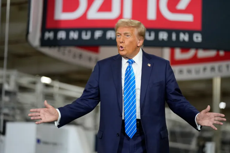 Republican presidential nominee former President Donald Trump gestures at a campaign event at Dane Manufacturing, Tuesday, Oct. 1, 2024, in Waunakee, Wis. (AP Photo/Charlie Neibergall)