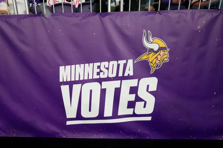 Minnesota Vikings Votes signage is seen in U.S. Bank Stadium during the first half of an NFL football game between the Vikings and the Indianapolis Colts, Sunday, Nov. 3, 2024, in Minneapolis. (AP Photo/Abbie Parr)