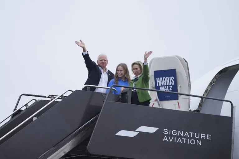 Democratic vice presidential nominee Minnesota Gov. Tim Walz with his daughter Hope Walz and wife Gwen Walz.
