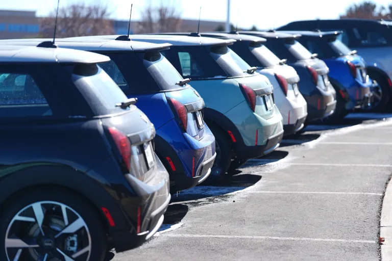 Unsold 2025 Cooper hardtops and Countryman utility vehicles sit on display at a Mini dealership Sunday, Feb. 9, 2025, in Highlands Ranch, Colo.