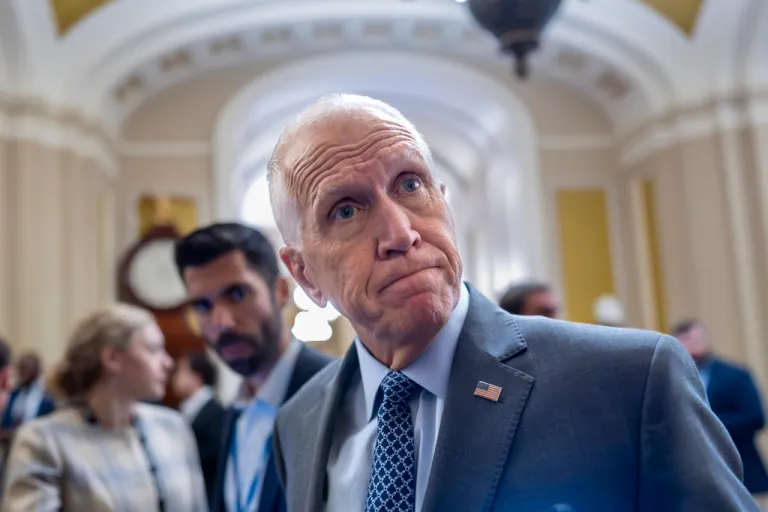 Sen. Thom Tillis, R-N.C., a member of the Senate Banking Committee, tells reporters that it would be a mistake for President Donald Trump to fire Federal Reserve Chair Jerome Powell, during a vote in the Senate, at the Capitol in Washington, Wednesday, July 16, 2025.