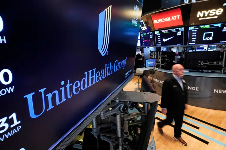 The logo for UnitedHealth Group appears above a trading post.