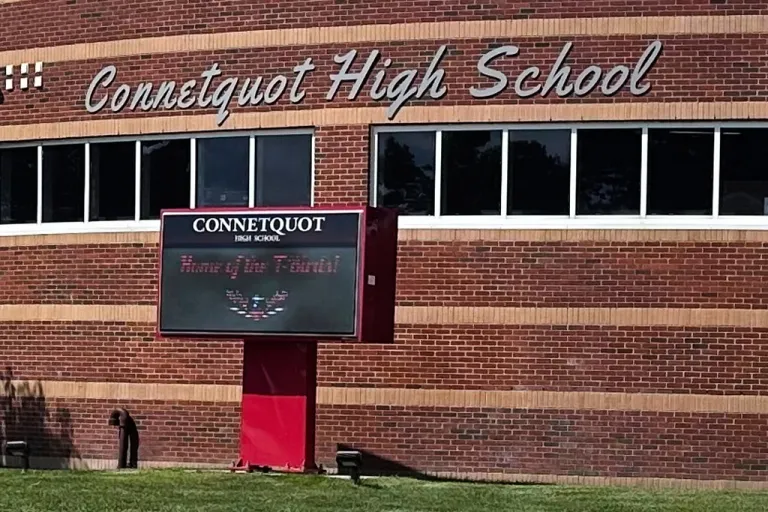 An electronic display shows the new mascot name, T-Birds, outside Connetquot High School in Bohemia, N.Y., Thursday, Sept. 4, 2025. (AP Photo/Philip Marcelo)