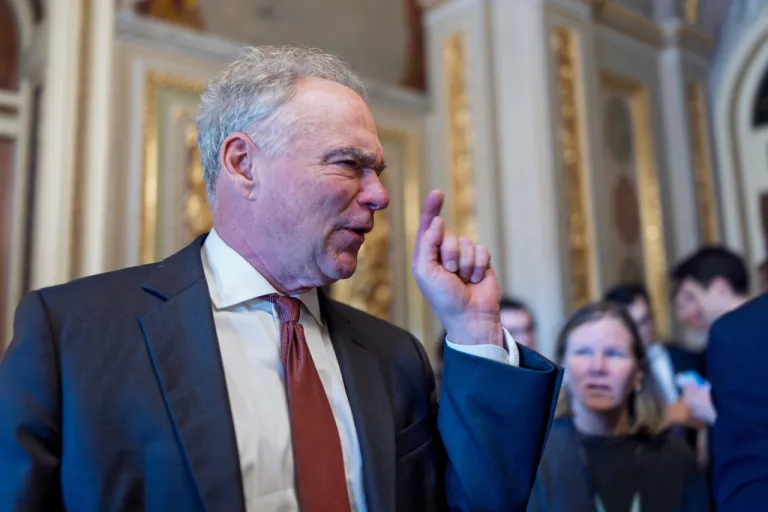 Tim Kaine points a finger