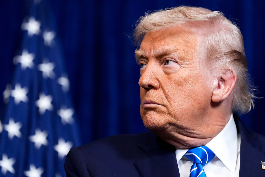 Trump warns Iran that US is ‘locked and loaded’ to rescue any peaceful protesters harmed