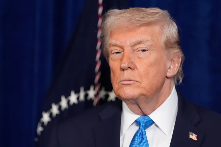 President Donald Trump listens as Defense Secretary Pete Hegseth speaks at Mar-a-Lago club, Saturday, Jan. 3, 2026, in Palm Beach, Fla.