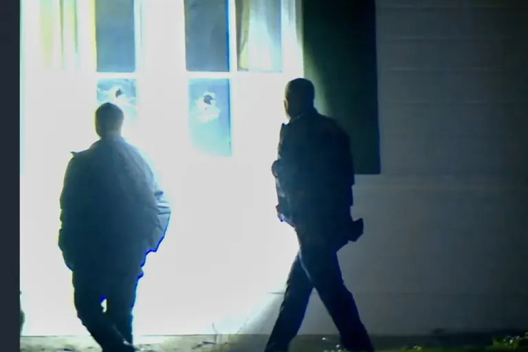In this image taken from WCPO 9 News, a video shows officials inspecting broken windows and other property damage at Vice President JD Vance's Ohio home in eastern Cincinnati, Ohio, Monday, Jan. 5, 2026.