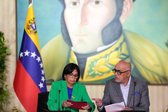 Venezuelan Vice President Delcy Rodríguez meets with her brother, National Assembly President Jorge Rodríguez, at the Foreign Ministry in Caracas, Venezuela.