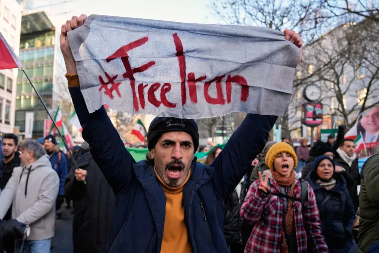 Protesters participate in a demonstration in Berlin, Germany, in support of the nationwide mass protests in Iran against the government, Saturday, Jan. 10, 2026.