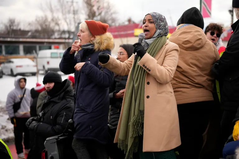 U.S. Representatives for Minnesota, Ilhan Omar, right, speaks during a rally for Renee Good, who was fatally shot by an ICE officer earlier in the week, in Minneapolis, Saturday, Jan. 10, 2026.